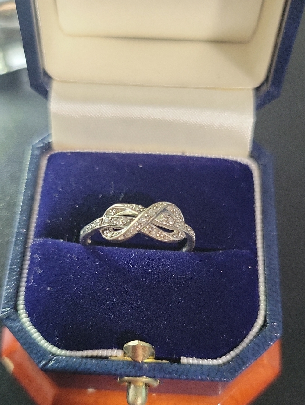 Elegant Silver Infinity Ring with Sparkling Stones - Women's Jewelry